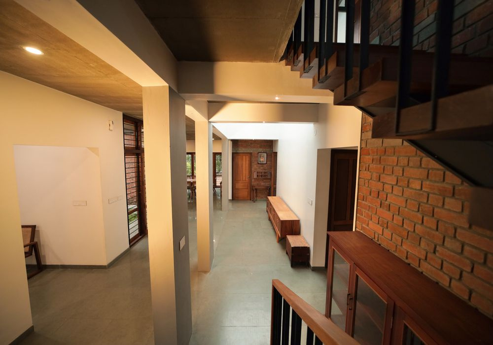 Architectural Staircase & Sunlit Foyer at Norah Retreat Homestay Kaduthuruthy